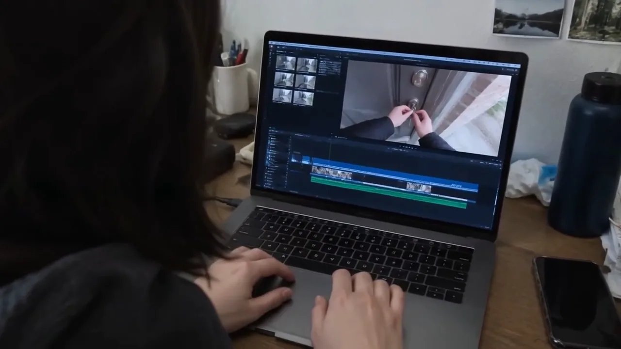 A frame from a finished AI avatar video before the final edit: plain footage of a laptop